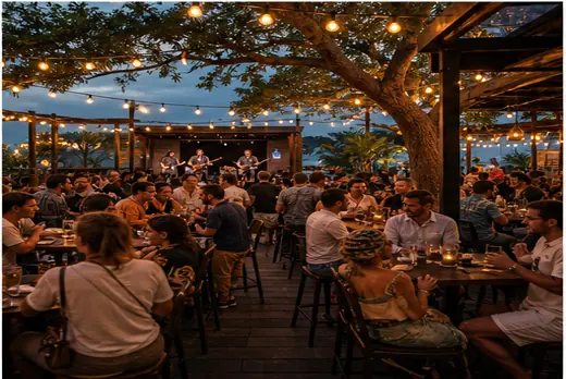 Outdoor live music venue with patio bar and crowd